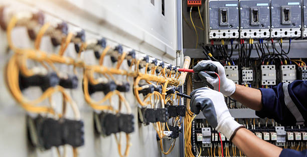 Professional Electrician technician working in Fenton, MI